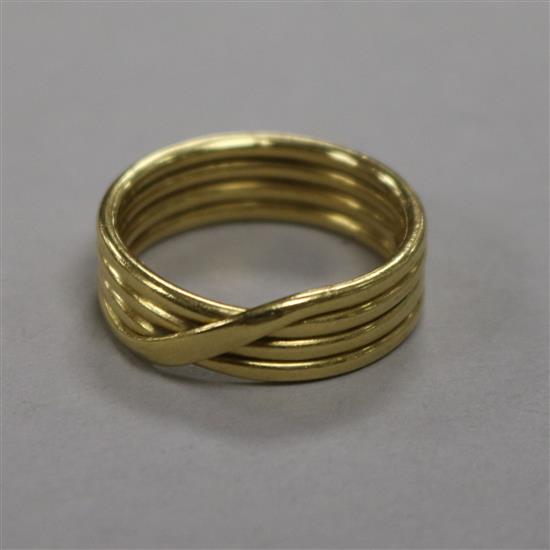 An 18ct yellow gold reeded cross-over wedding band, 9.9g, size T.